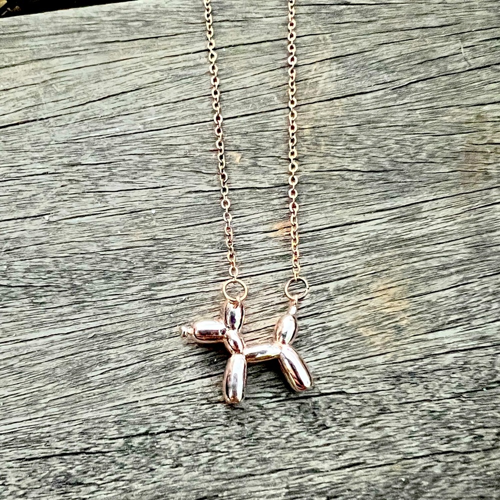 Rose gold tone balloon animal charm necklace